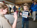 A new junior ranger is sworn in at the Denali Visitor Center