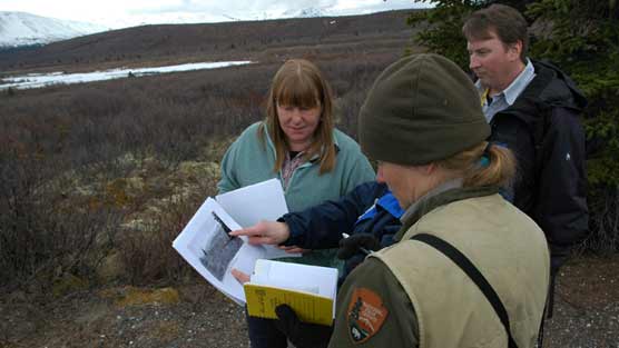 Park employees work on trail plans near Savage River