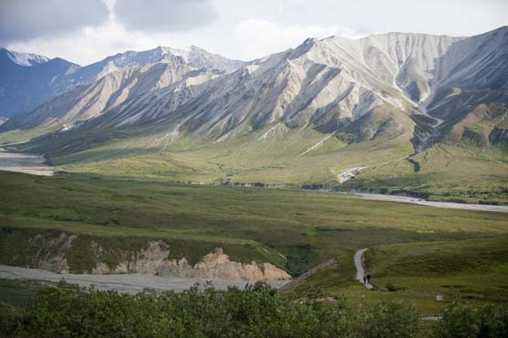 Visitors enjoy a stroll outside Eielson Visitor Center