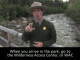 Image of a ranger signing in ASL