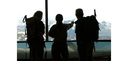 A ranger speaks with day hikers