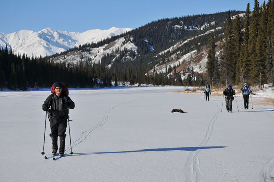 Cross-country skiiers on one of the Triple Lakes
