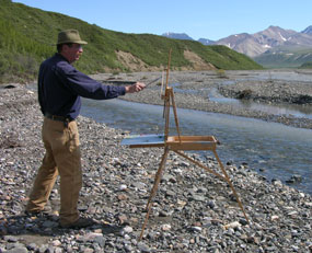 Rod Weagant, artist-in-residence, paints near the East Fork River