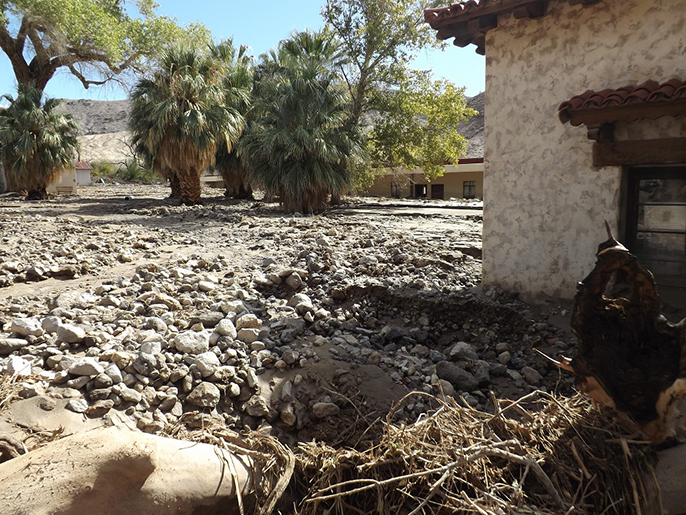 rocks and flood debris inundated the area around historic Scotty's Castle