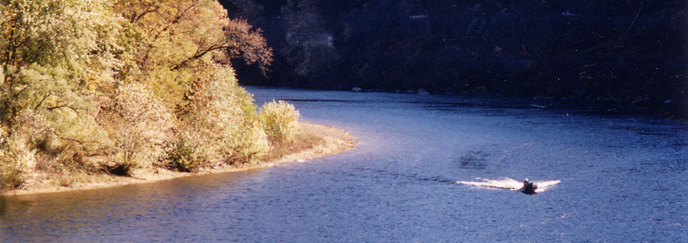 A boat rounding a curve in a river