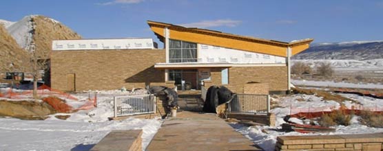 View of the exterior of the visitor center still under construction. 