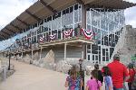 Ranger welcomes visitors to Quarry Exhibit Hall grand opening. 