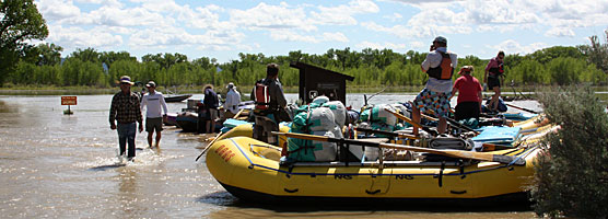 A rafting trip prepares to launch on Thursday, June 9, 2011 from Deerlodge Park on the Yampa River.