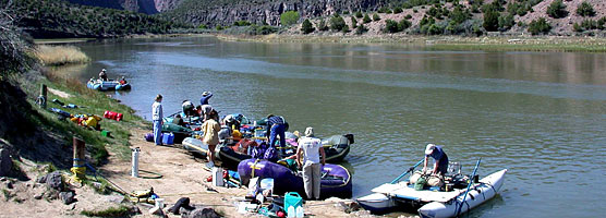 A rafting trip prepares to depart from the Gates of Lodore on the Green River.