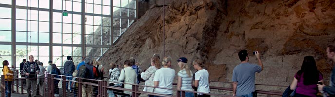 Visitors wander along the upper mezzanine at the Quarry Exhibit Hall.