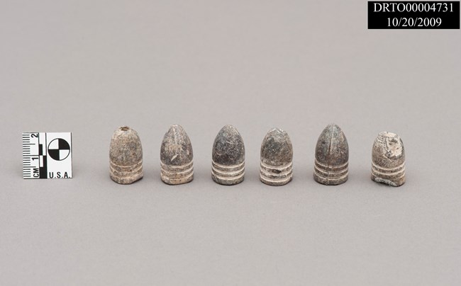 Six conical shaped Minié bullets used in the 19th century