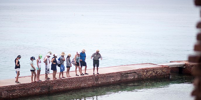 A ranger leads a program on the moat wall of Dry Tortugas National Park.