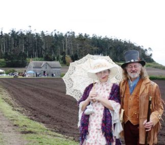 Volunteers show guests the historic Ferry House on Ebey's Prairie