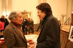 Photo of Poe Scholar Daniel Hoffman and Poe chat