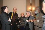 Photo Poe chatting with guests