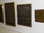 Photo of Prior historic Poe site plaques on wall