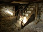 Photo of Staircase in basement of Poe's home