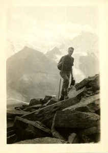 Theodore Edison hiking on a mountain, probably in the Grand Tetons.