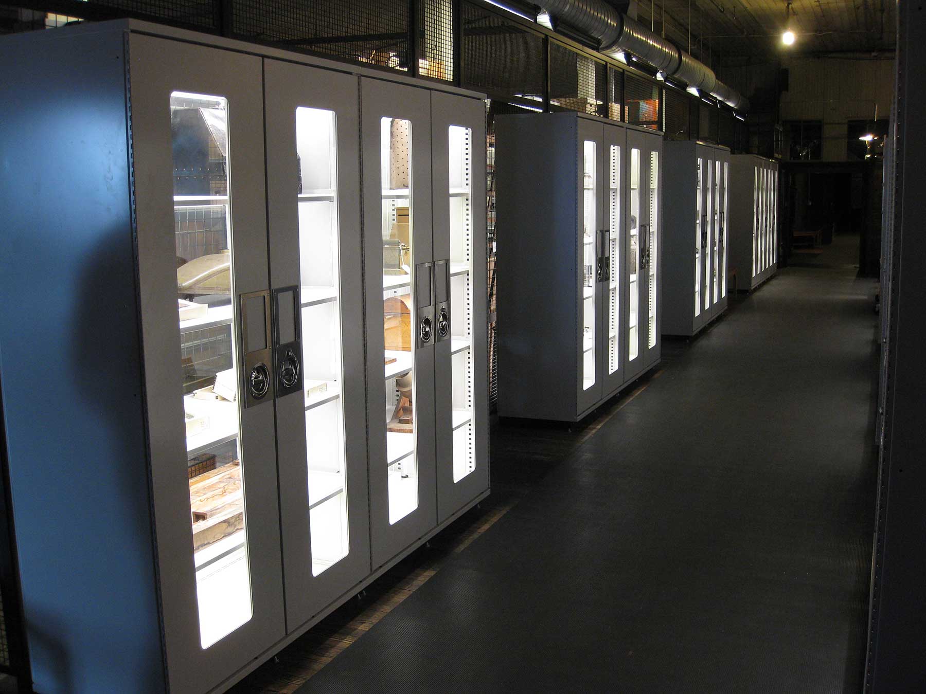Installation of cabinet lights in third floor open storage 