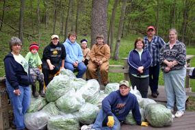 VIPs With Bags of Garlic Mustard.
