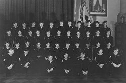 The 1942-1943 class of the Coast Guard Quartermaster and Signalmen's School on Ellis Island.