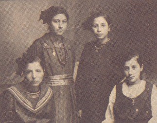 Doukenie, third from left, in 1918 with friends in her home country.