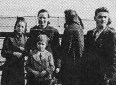 Nelly Ratner (Myers) on the left, next to her mother and sister, on board the Rex.