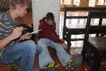Students carefully measure benches