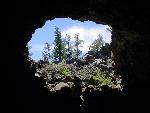 The wide entrance of Four Windows Cave.