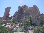A butte stands near the cliffs at Sandstone Bluffs