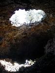 A skylight in a lava tube cave