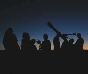 Visitors enjoy views of the galaxy at the visitor center.