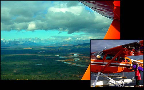 An aerial view shows the Kobuk River curving through the 
			flatlands with the Brooks Range in the distance on a cloudy day. Inset photo: 'The pumpkin' is the 
			National Park Services orange and brown float plane