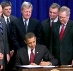 President Obama signing legislation extending tax cuts