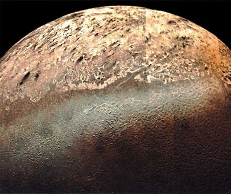 NASA photo of Triton showing drak spots dark spots presumed to be geysers