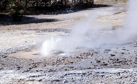 Minute Geysers sends out a small splash of water and steam