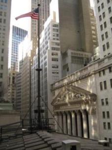 This photo, taken from the roof of Federal Hall, displays the surrounding urban landscape of the Financial District. 