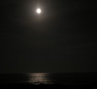 Moon over ocean.