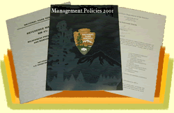 Stack of booklets, topped with Management Policies 2001 illustrated by large NPS arrowhead.