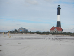 Fire Island Lighthouse and Fresnel Lens Building from beach