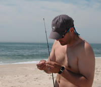 Fisherman on beach.