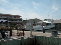 Ferry boat at dock in center of community.