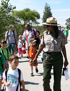 A ranger leads a hike at Indiana Dunes National Lakeshore A ranger leads a hike at Indiana Dunes National Lakeshore