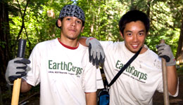 Two volunteers on a trail work project