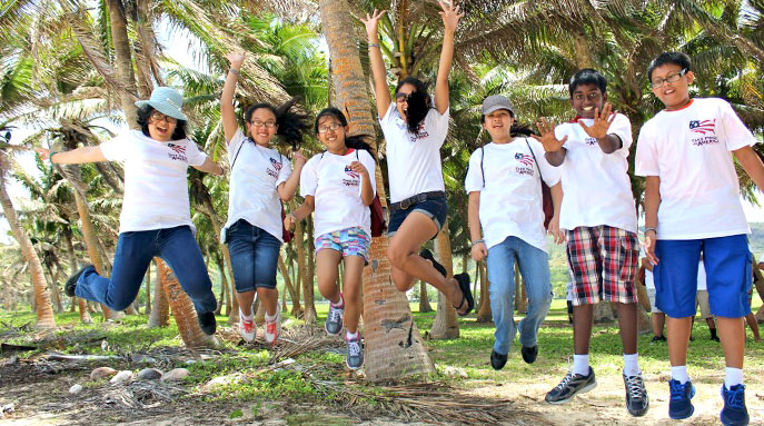 Junior rangers leap with enthusiasm at War in the Pacific National Historical Park Junior rangers leap with enthusiasm at War in the Pacific National Historical Park