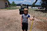A junior ranger with his rake