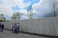 Visitors at the Wall of Names