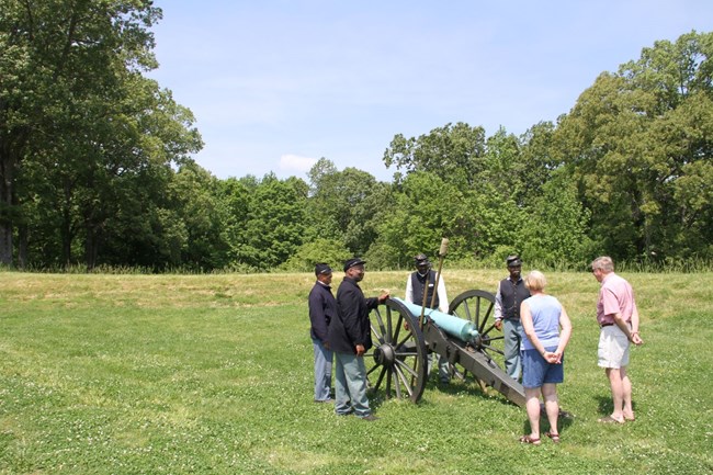 Civil War reenactors with original cannon