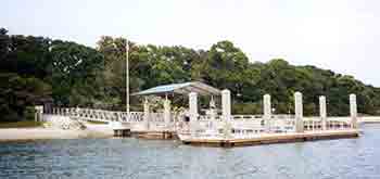 The new (2001) dock offers a shaded waiting area for visitors and provides dockage for the park's two boats.