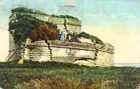 An old post card of Fort matanzas with tourists in long dresses.